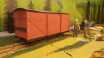 Put on black around the frame and end beams. Bogies in place, couplers installed. New proper roof made and painted. Lettering - not so much ... No problem cutting them, the Curio machine could have made them even smaller. The problem is to let the ...