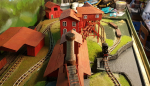 Cableway and transporters in place. I could continue with the buildings for a bit longer, but next I want to do something else, so painting/weathering tracks will be it.