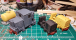 Washed them in hot water and dish-washing liquid yesterday. Today I put on some primer and first paint on the 0f locos and wagons. The dull-coat bottle was empty so will have to be another day.