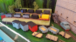 Here is the rest wagons assembled (only the mine wagons was left to do). Now I have no more prints waiting to be put in traffic. Not even have any wheels left to do more than one and a half wagon.. (yes one axle is missing)