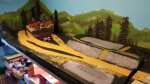 Added a second layer of putty to the hillside, plus painted it gray.  This evening I turned around the layout  and added first layer of grass and ´magic dust´ to the waist pile.