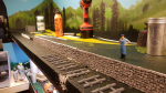 Started building the background team track a few days ago.  Glued on first stone wall against the platform this morning. Further away there will be an ore loading ramp for the ore wagons. For this the first sleepers looked a bit to much up-scaled peco....