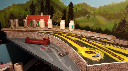 153653  -- last pieces of the platform side wall in place