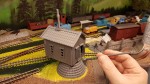 So finally, all walls and roof in place! A bit fiddling left to do plus paint and chains, but starting to look like a crane now (or small house on a hump...) First pic shows how big the boom should be according to the drawing. Didn´t reach anywhere, so..