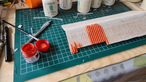 130241  -- glued onto roof board, painting
