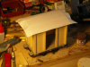 Pict2755 -- Roof is covered with a piece of an old bed sheet, glued and let dry. When dry I cut of the edges leaving a few mm and glue once again. Makes perfect surface when painted.