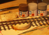 April 2011 -- My recepie for nice tracks. Tamiya Sea gray XF-54 and Nato brown XF-68, both with a bit extra flat base added.<p>